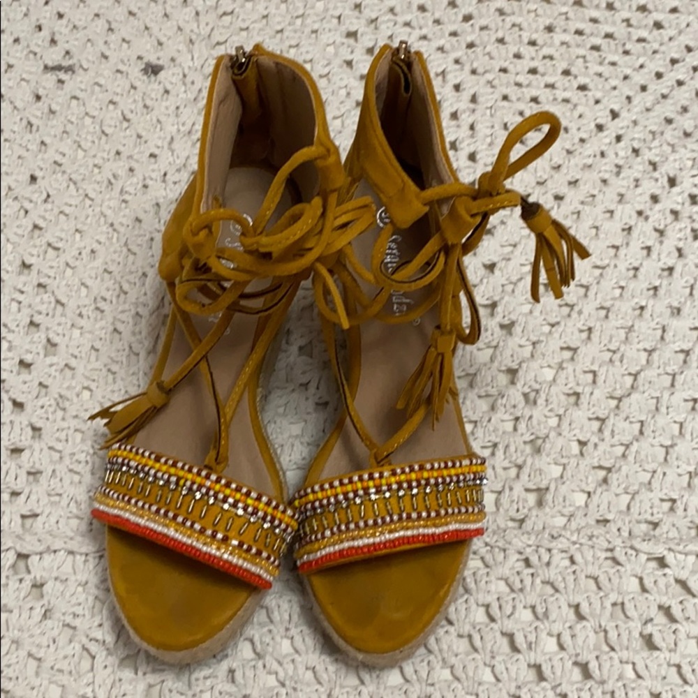 Unique Pair of shoes with nicely decorated beads